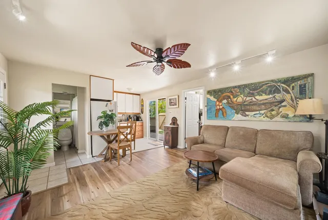 a kitchen with a table and chairs in it