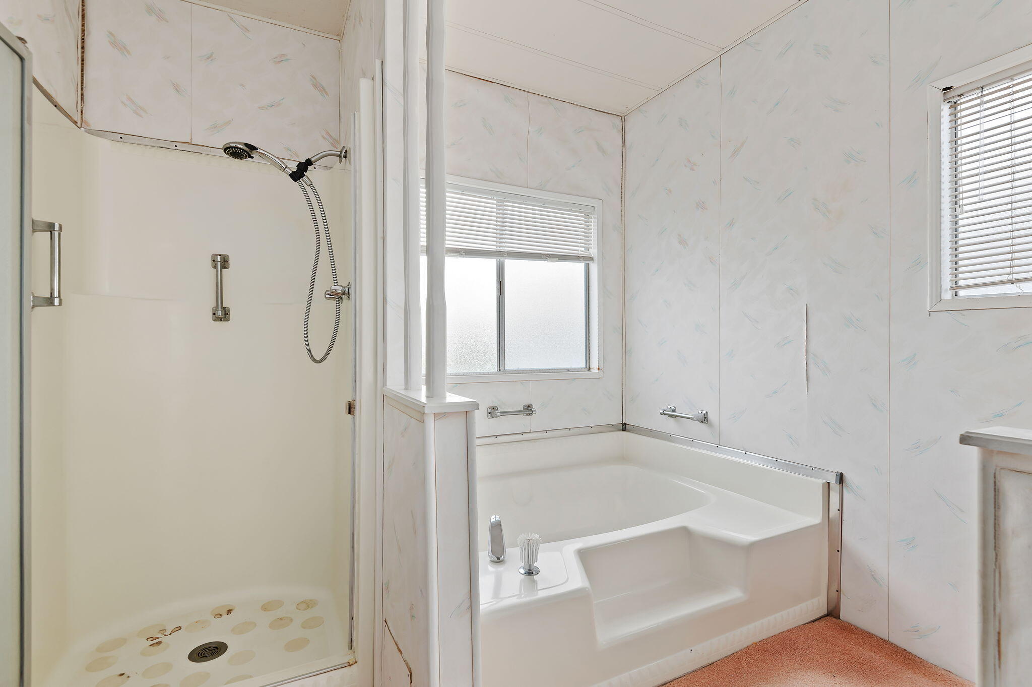 333 Old Mill Road, Unit 157 Santa Barbara, CA 93110 - Photo 11 of 12 a bathroom with a bathtub and a shower