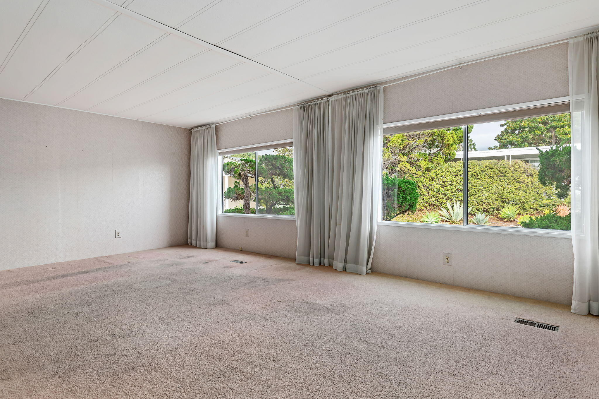 333 Old Mill Road, Unit 157 Santa Barbara, CA 93110 - Photo 4 of 12 a view of an empty room with a window