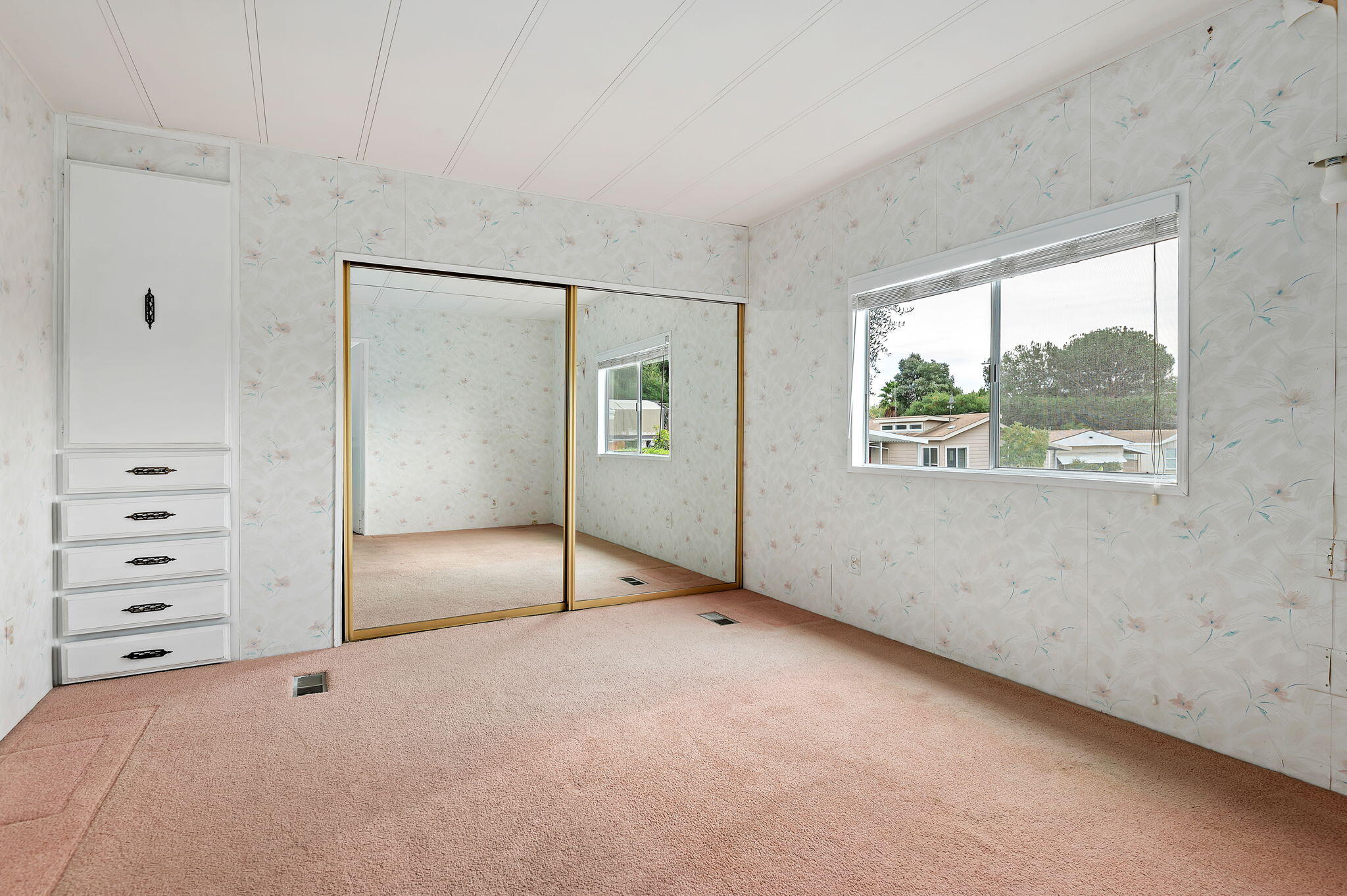 333 Old Mill Road, Unit 157 Santa Barbara, CA 93110 - Photo 9 of 12 an empty room with windows