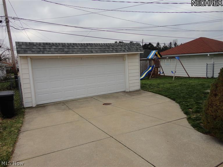 12116 Grannis Road Garfield Heights, OH 44125 - Photo 14 of 14 2 car garage! Fenced in back yard with gate over driveway!