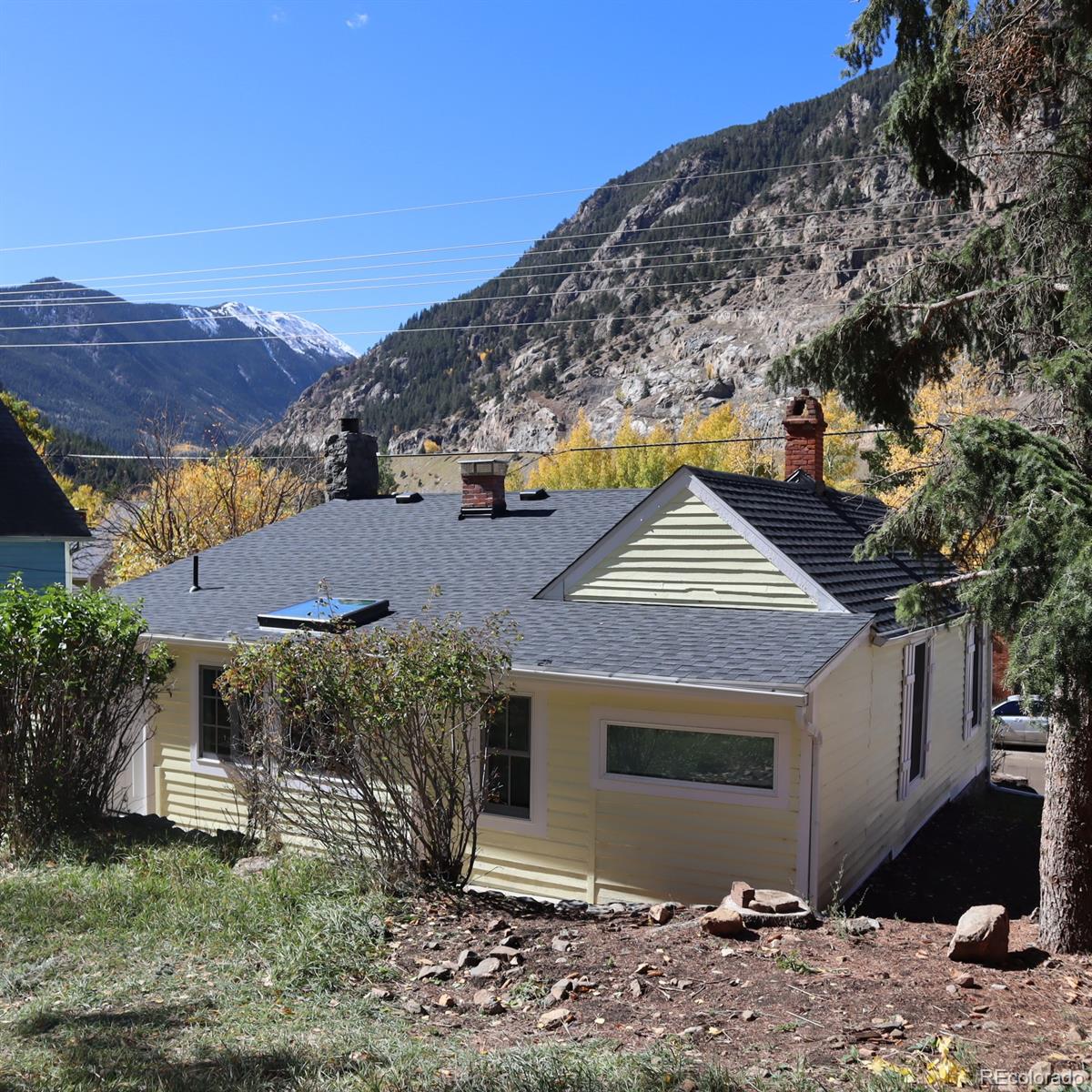 906 Main Street Georgetown, CO 80444 - Photo 25 of 26 a view of a house with a yard