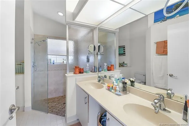 a view of a chairs and table in a balcony