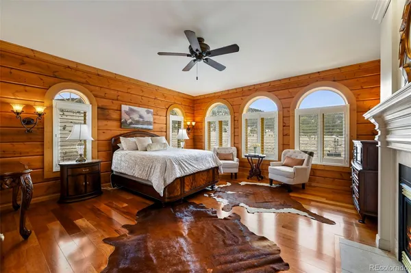 a view of living room and fire place