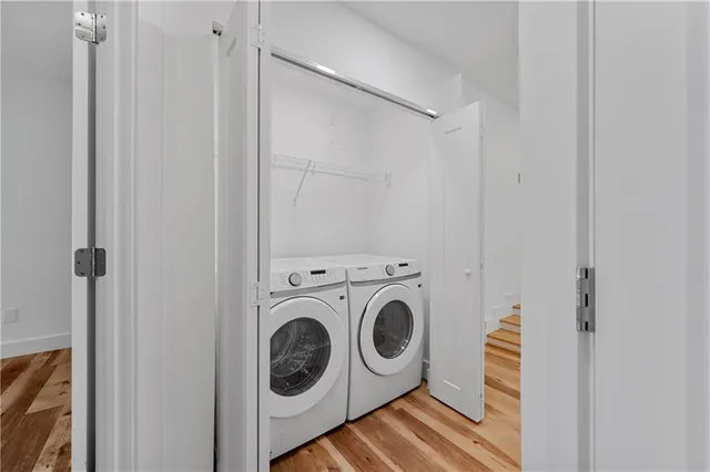 a utility room with dryer and washer