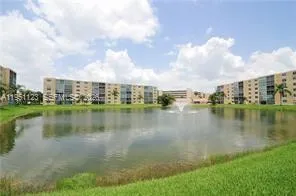 a view of a lake with houses
