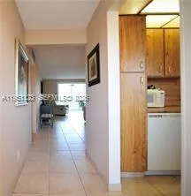 a view of a dining room with furniture and window