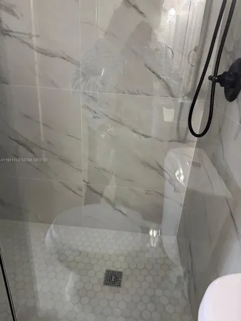 a view of an empty room with a sink