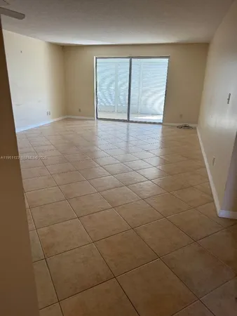 a view of a lake with a yard