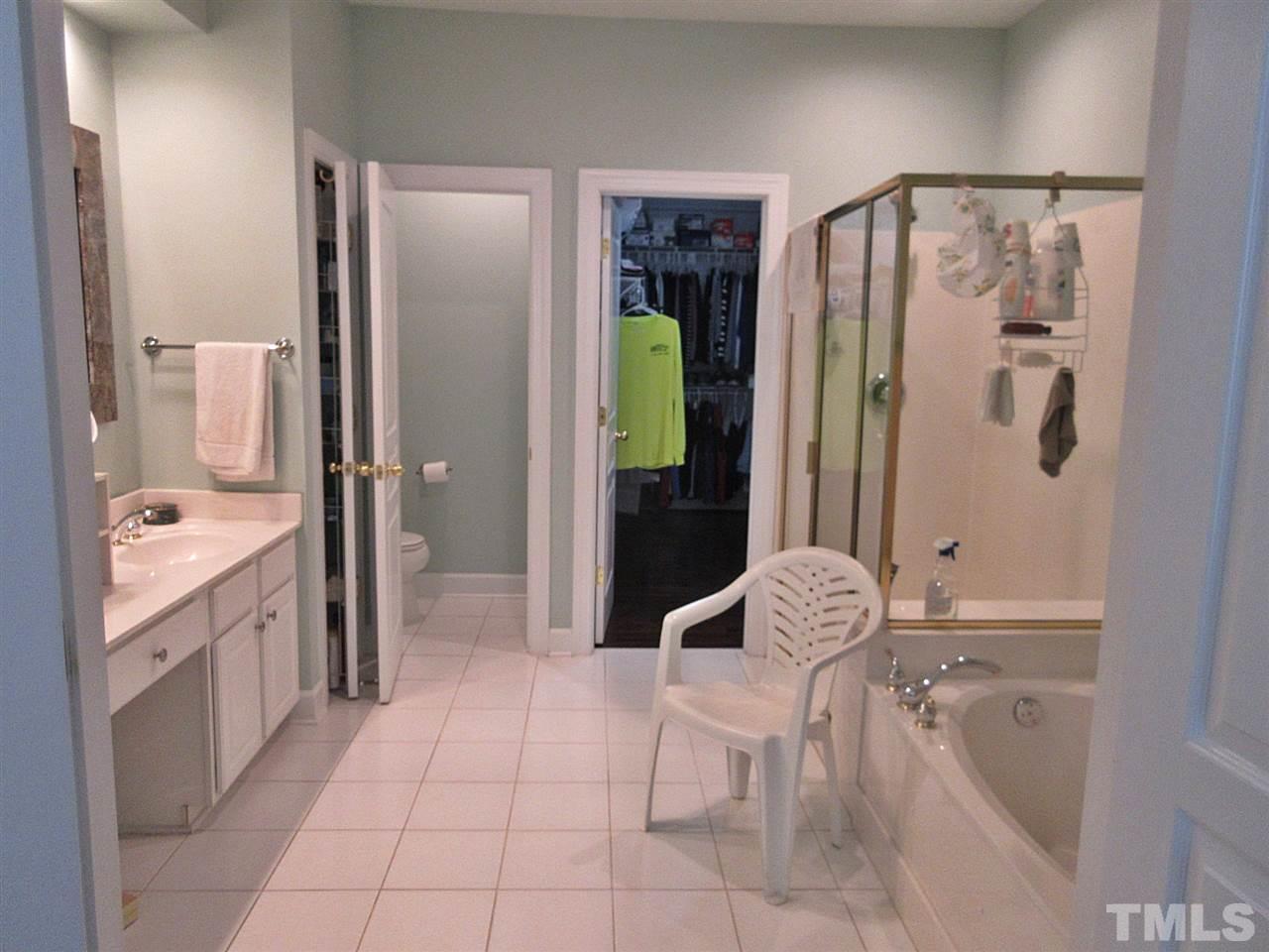 3920 Sunset Maple Court Raleigh, NC 27612 - Photo 12 of 30 Master Bathroom on Main Floor with Walk-in Closet.