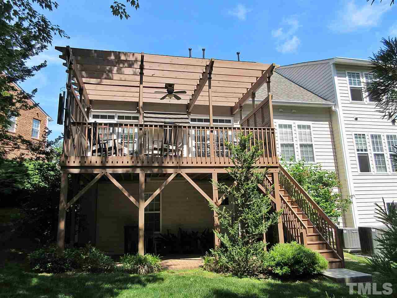 3920 Sunset Maple Court Raleigh, NC 27612 - Photo 22 of 30 View of Deck and Pergola from rear of Unit.