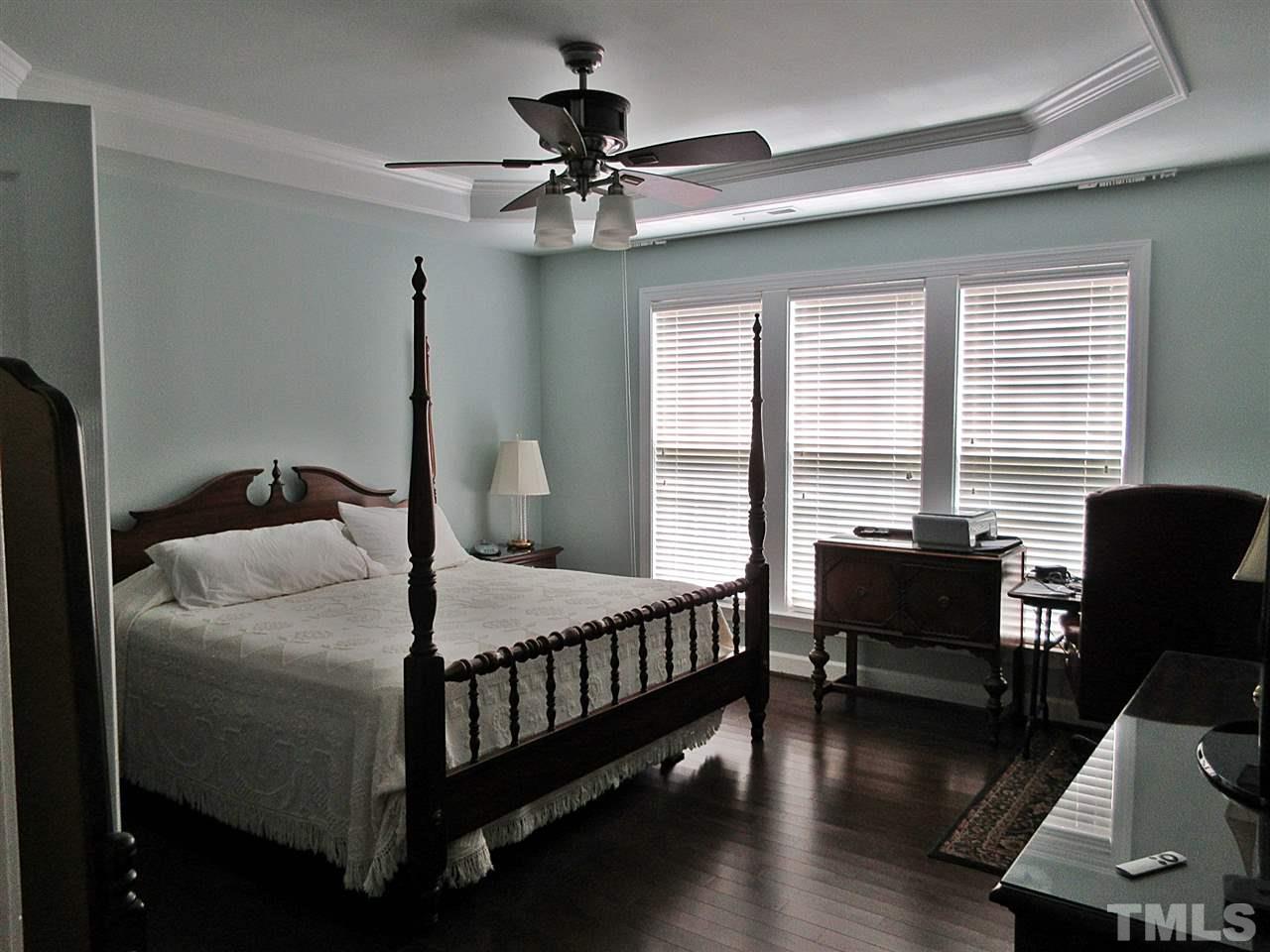 3920 Sunset Maple Court Raleigh, NC 27612 - Photo 10 of 30 Large Master Bedroom on First Floor with New Hardwoods.