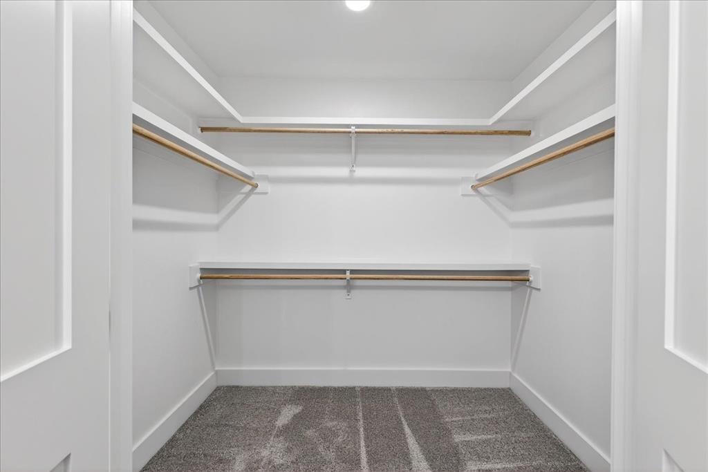 114 Castlewood Road Enchanted Oaks, TX 75156 - Photo 26 of 33 a view of an empty walk in closet