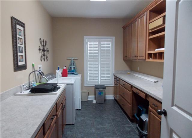2830 Burgess Gower Road Springfield, TN 37172 - Photo 15 of 20 A to die for Laundry Room! Check out the storage and Counter Space.
