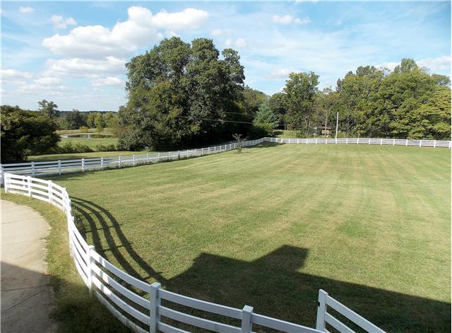 2830 Burgess Gower Road Springfield, TN 37172 - Photo 3 of 20 Picture your pets, horses and family in this wonderful yard, fenced with white vinyl. Don't stop there, the property goes beyond fence and includes stable/workshop and storage building.