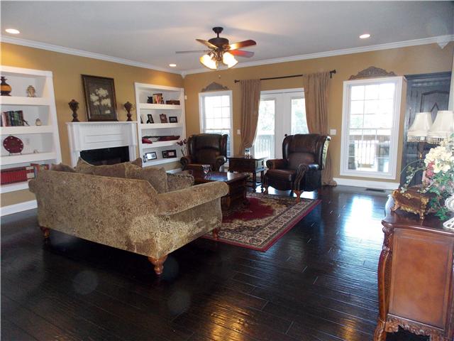 2830 Burgess Gower Road Springfield, TN 37172 - Photo 5 of 20 The Great Room is spacious with lots of wall space, gas fireplace, scraped wood floors & gorgeous views!