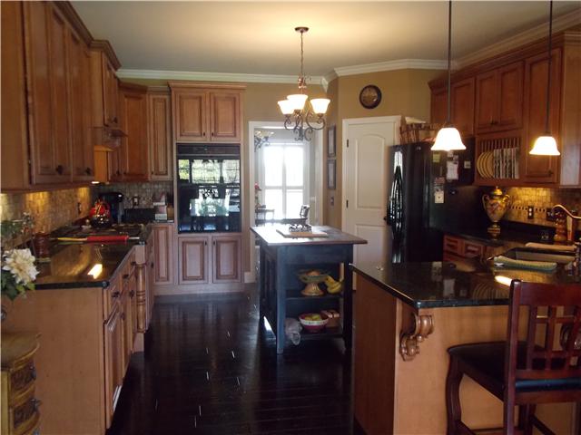 2830 Burgess Gower Road Springfield, TN 37172 - Photo 6 of 20 Meal Time! Granite Counters, Country Sink, Under Counter Lighting, Glass Tile Backsplash, Double Oven, 5 Gas Burner Cooktop, & Gorgeous Cabinets!