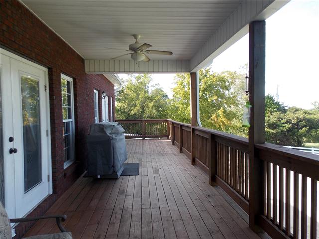 2830 Burgess Gower Road Springfield, TN 37172 - Photo 10 of 20 Time to Relax! Sit outside in all weather. The deck is partially covered and accessed from both the Master and the Great Room!
