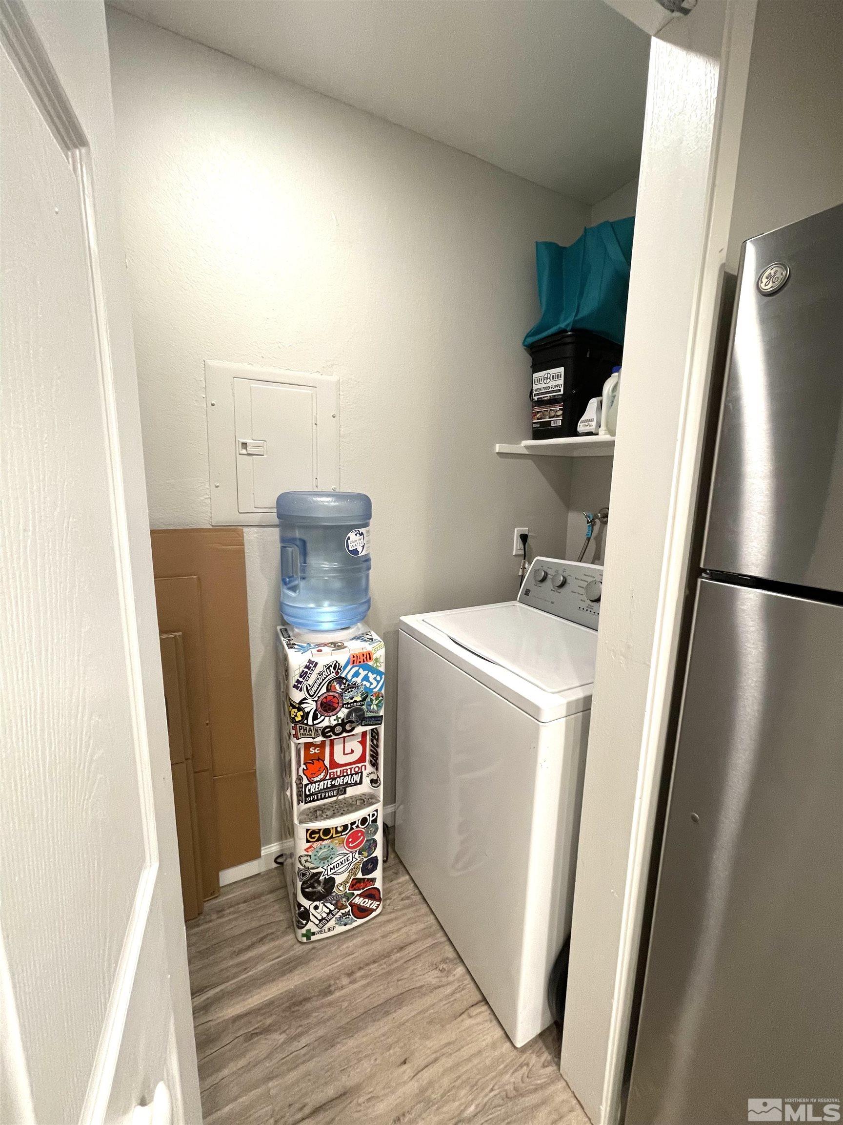 7680 Bluestone Drive, Unit 409 Reno, NV 89511 - Photo 12 of 16 a room with storage and utility
