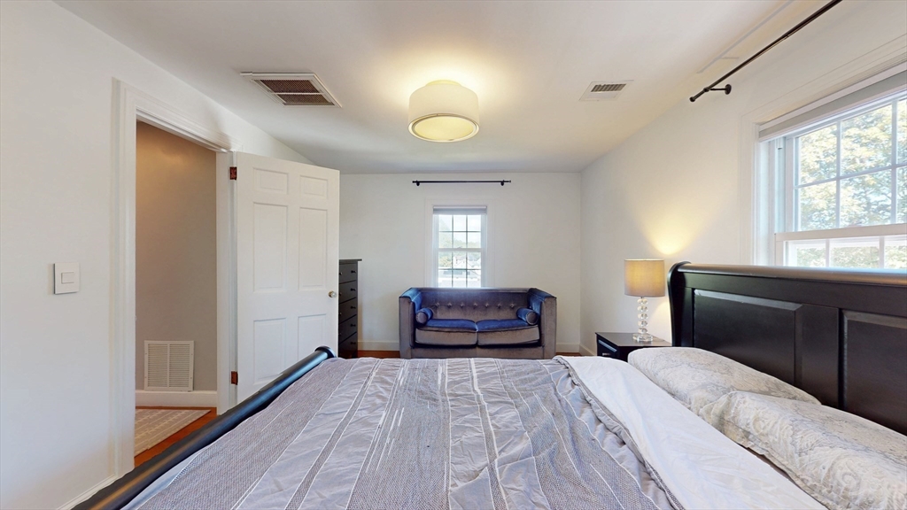 49 Ripley Road Medford, MA 02155 - Photo 11 of 27 a bedroom with a bed and a window