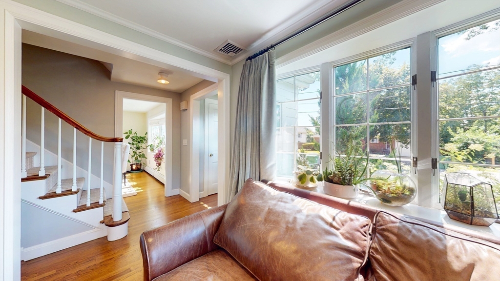49 Ripley Road Medford, MA 02155 - Photo 12 of 27 a living room filled with furniture and a large window