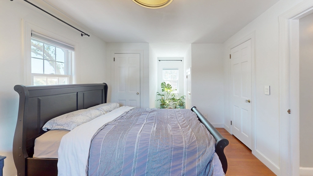 49 Ripley Road Medford, MA 02155 - Photo 17 of 27 a bedroom with a bed and a window