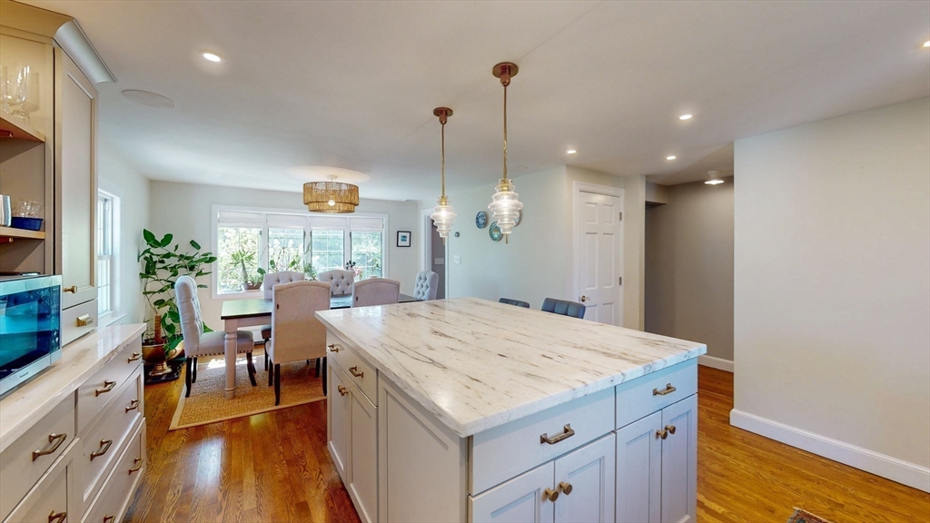 49 Ripley Road Medford, MA 02155 - Photo 6 of 27 a view of a kitchen and dining table