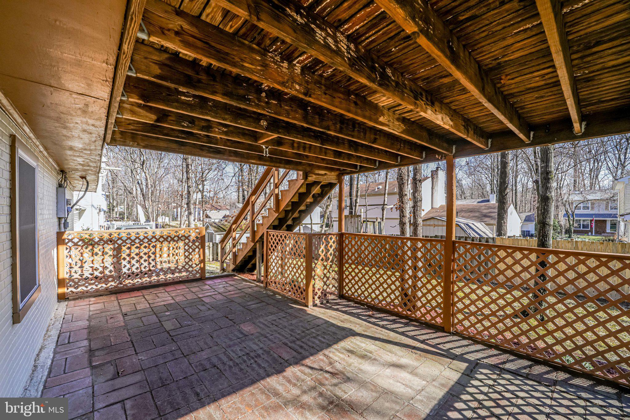 10177 Marshall Pond Road Burke, VA 22015 - Photo 54 of 66 Paver patio under the deck