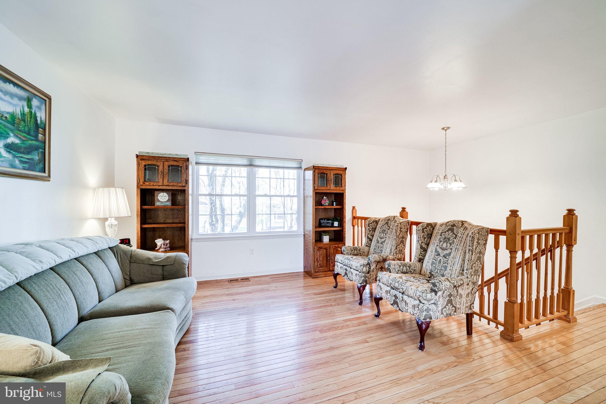 Living room with refinished hardwood floors