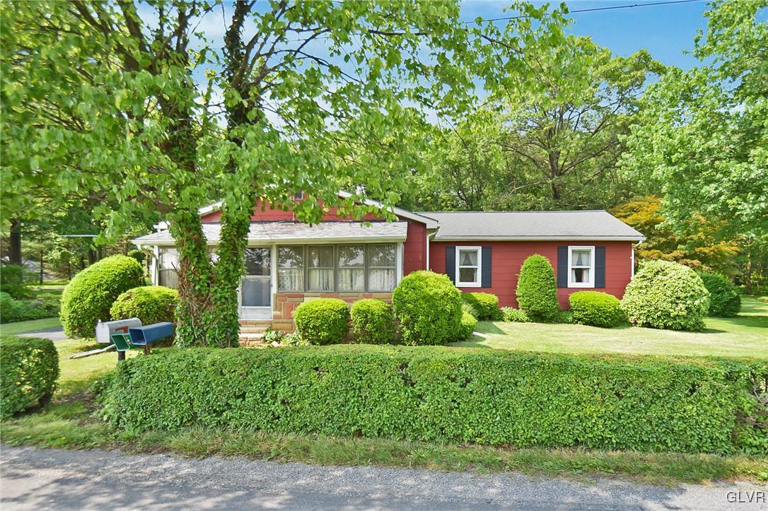 3015 Mountain Road Slatington, PA 18080 - Photo 1 of 32 a view of a house with yard and plants