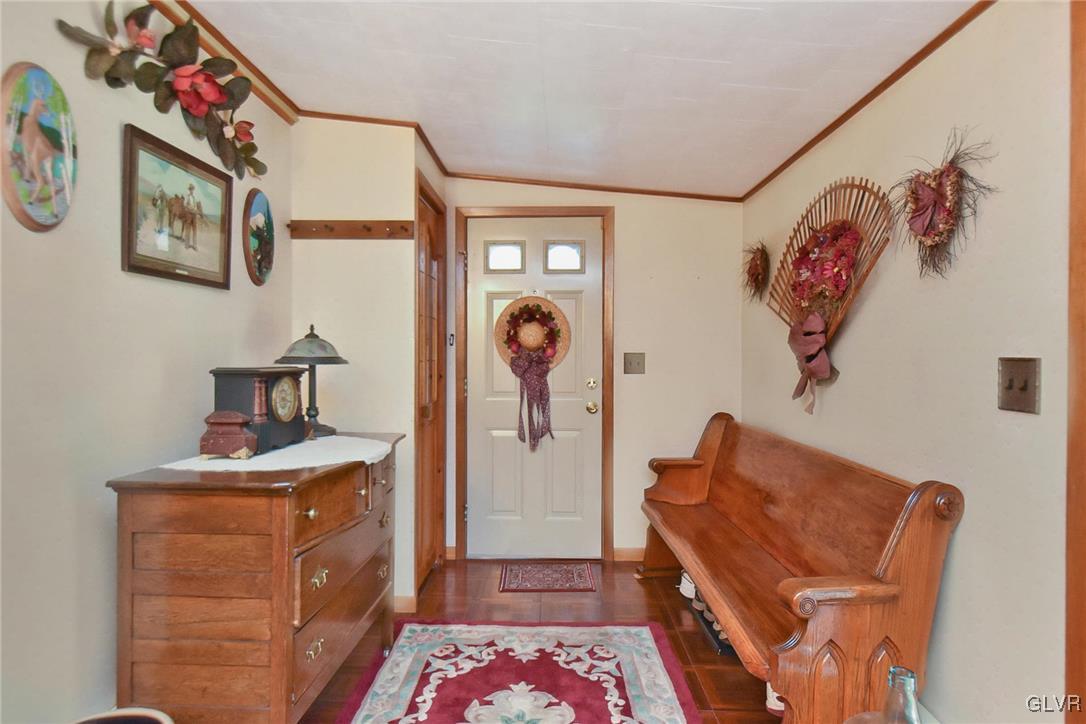 3015 Mountain Road Slatington, PA 18080 - Photo 11 of 32 a living room with furniture and a baby crib