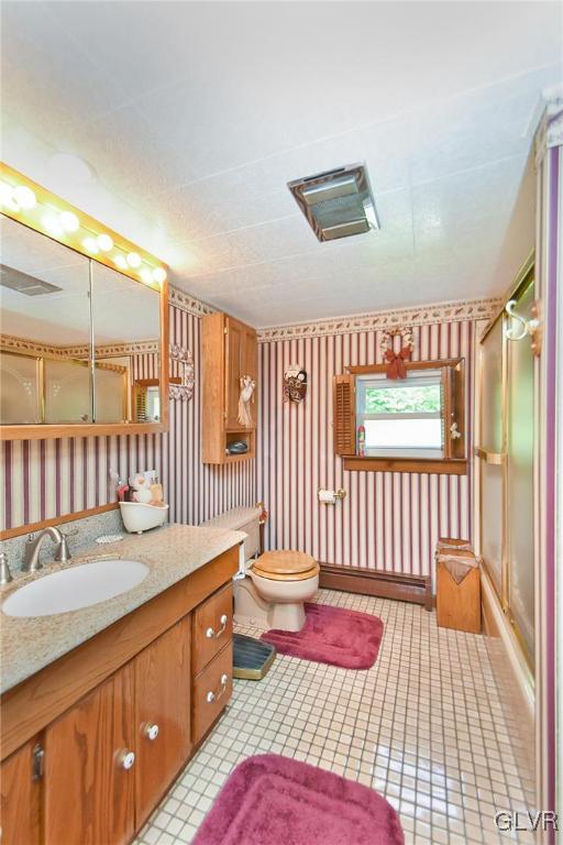 3015 Mountain Road Slatington, PA 18080 - Photo 14 of 32 a bathroom with a sink double vanity and a tub