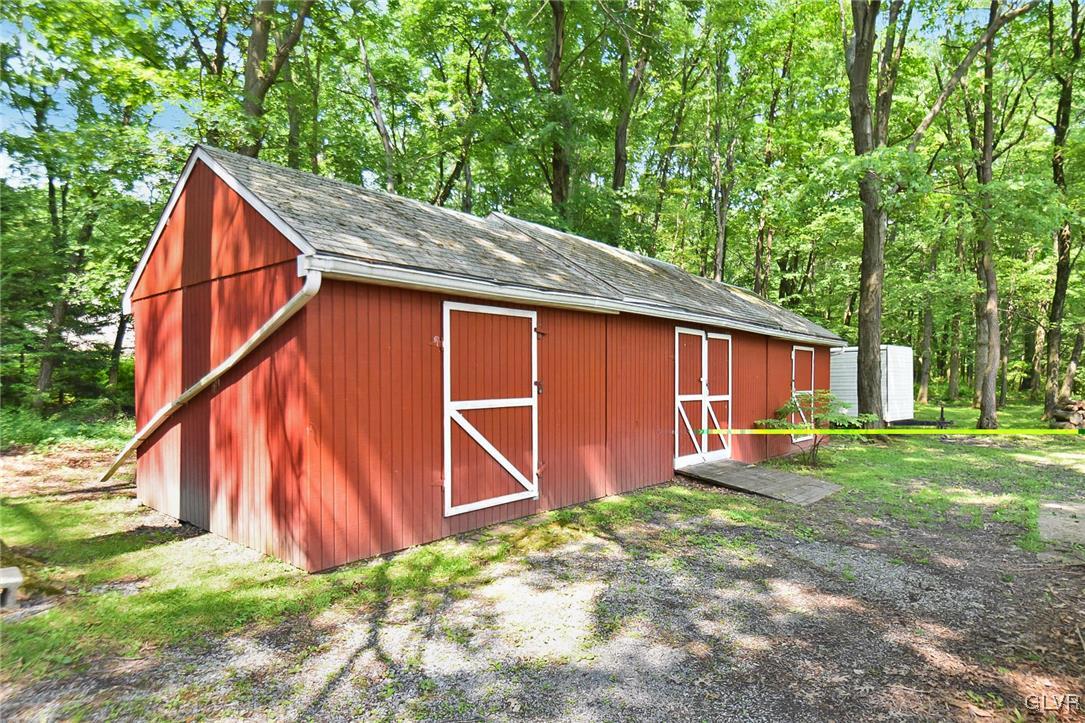3015 Mountain Road Slatington, PA 18080 - Photo 25 of 32 a backyard of a house with table and chairs