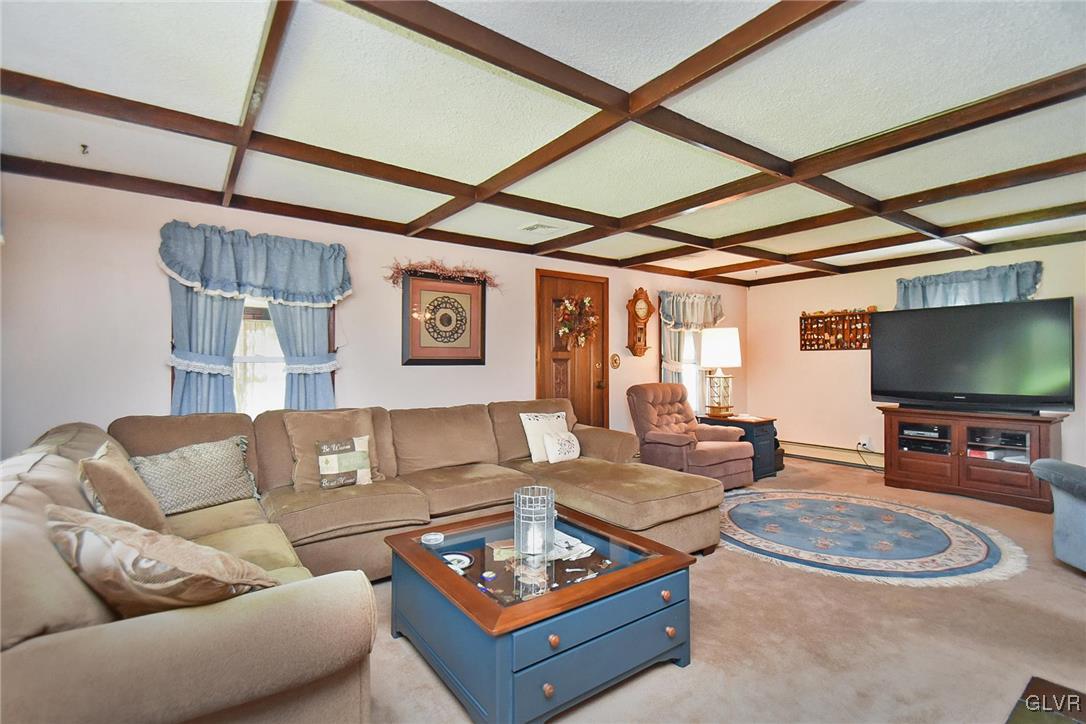 3015 Mountain Road Slatington, PA 18080 - Photo 4 of 32 a living room with furniture and a flat screen tv