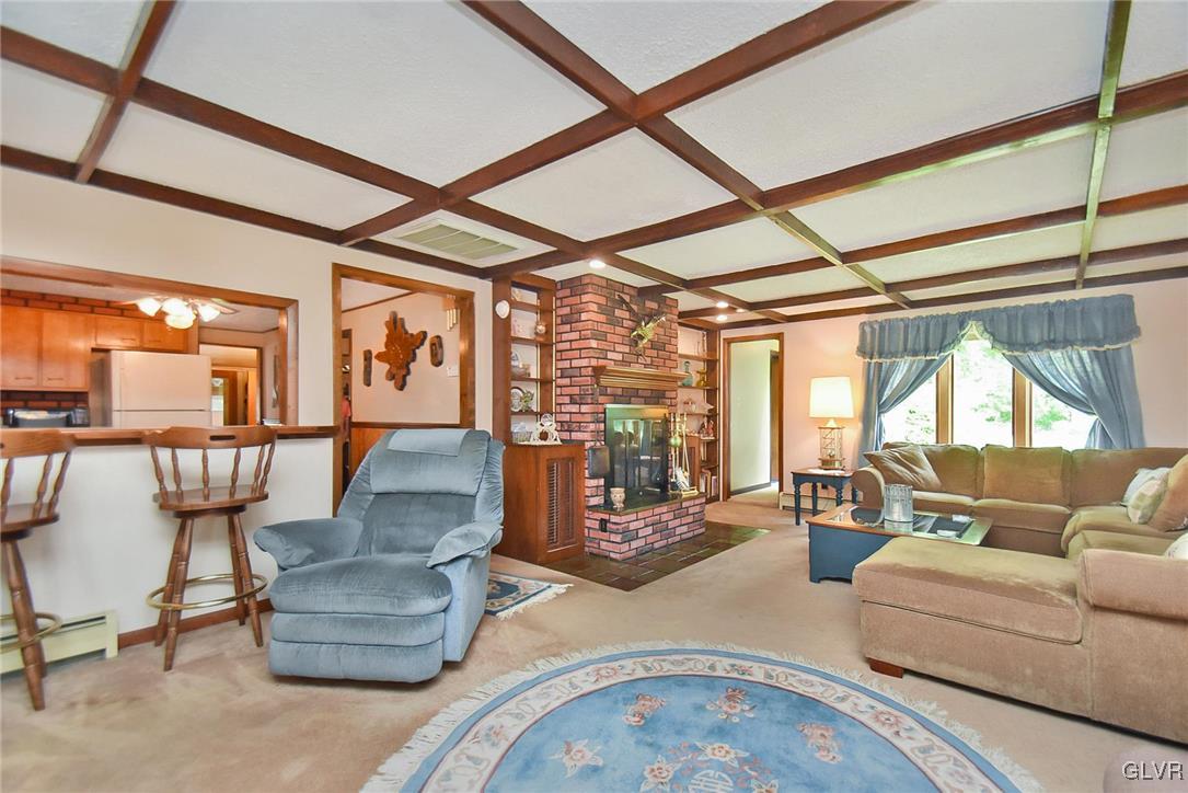 3015 Mountain Road Slatington, PA 18080 - Photo 6 of 32 a living room with fireplace furniture and a large window