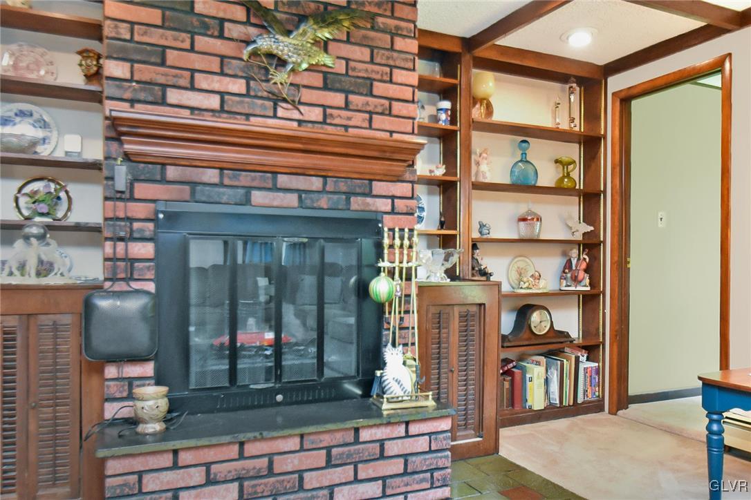 3015 Mountain Road Slatington, PA 18080 - Photo 8 of 32 a room with lots of books and a large window