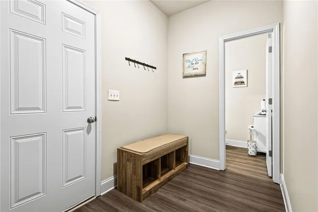 a room with a bed and a view of bathroom