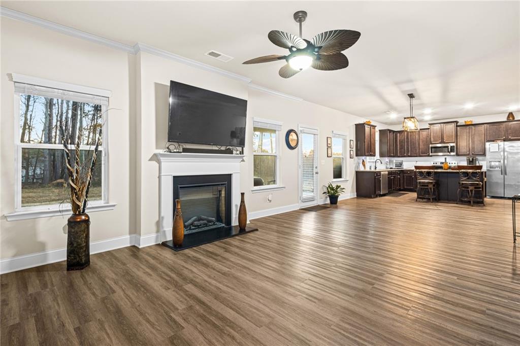 61 North Village Circle Rydal, GA 30171 - Photo 5 of 18 a view of a living room a fireplace with a flat screen tv