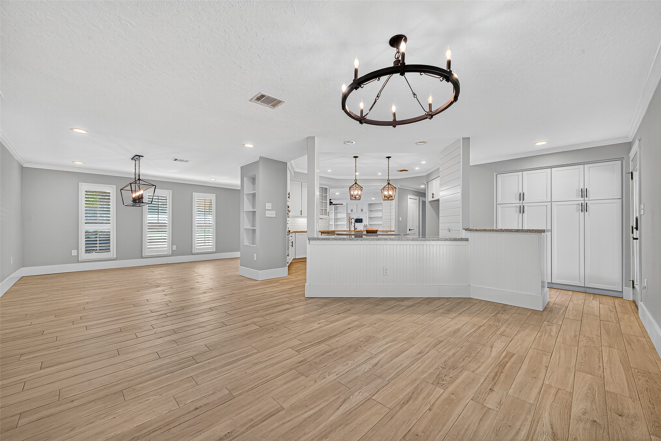 3115 Eula Morgan Road Katy, TX 77493 - Photo 11 of 36 a view of a kitchen with wooden floor and a sink