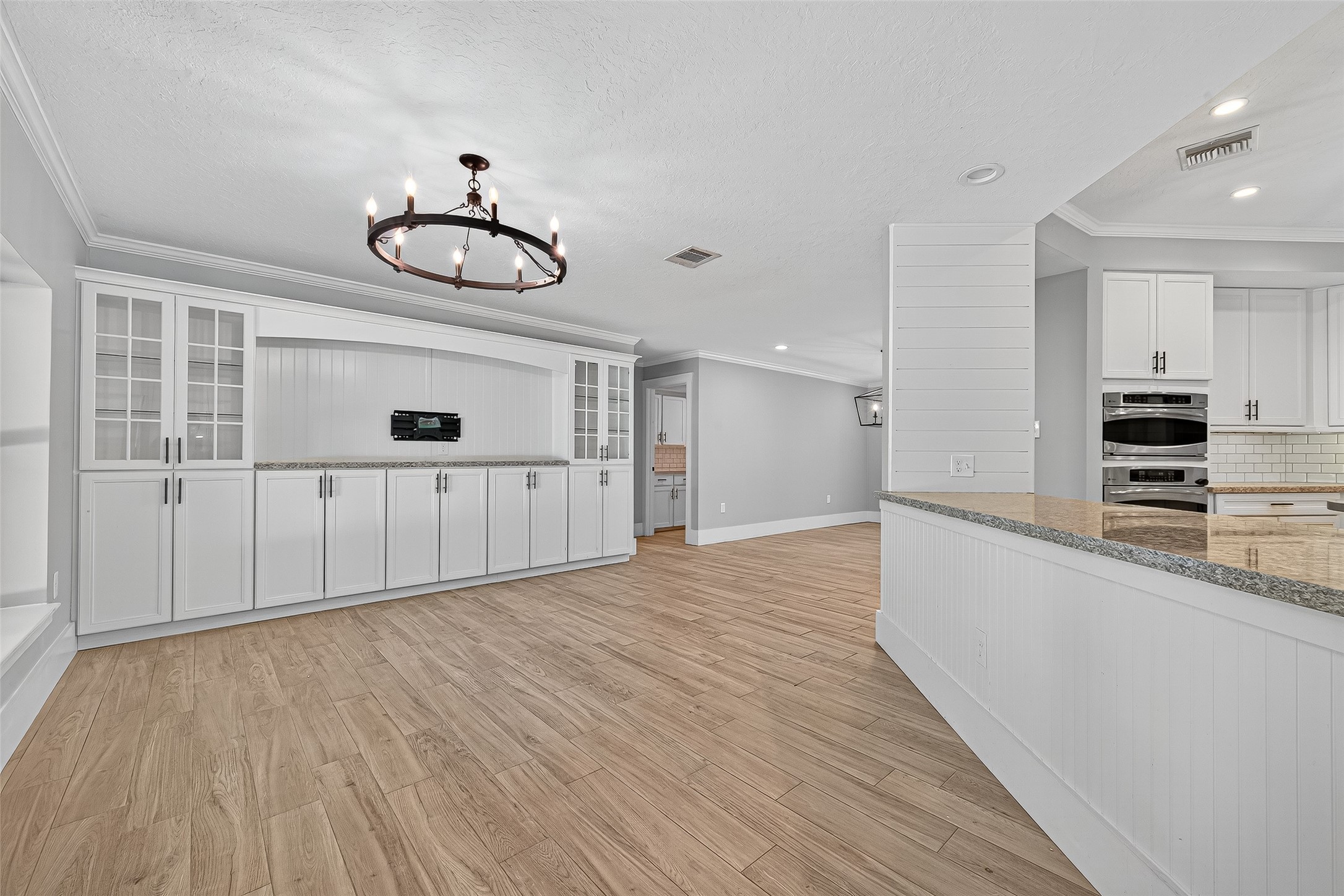 3115 Eula Morgan Road Katy, TX 77493 - Photo 12 of 36 a view of a kitchen with wooden floor and window