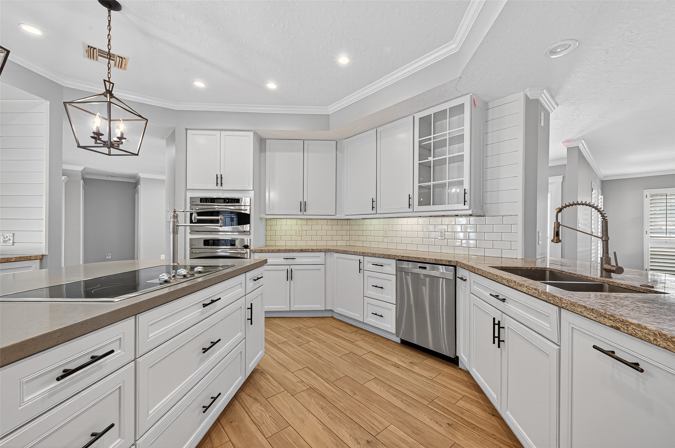 3115 Eula Morgan Road Katy, TX 77493 - Photo 15 of 36 a kitchen with cabinets appliances and a sink