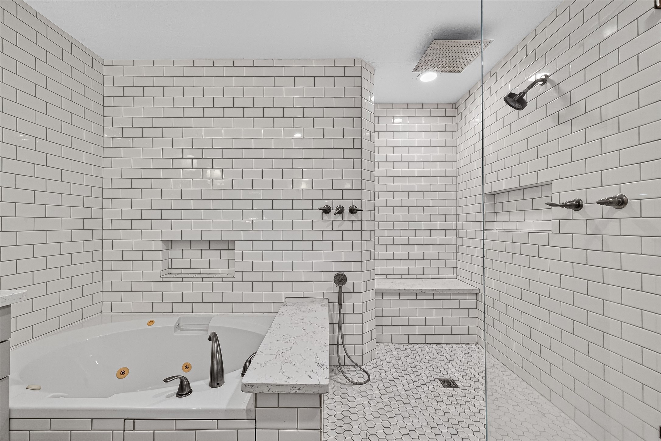 3115 Eula Morgan Road Katy, TX 77493 - Photo 22 of 36 a bathroom with a bathtub and shower