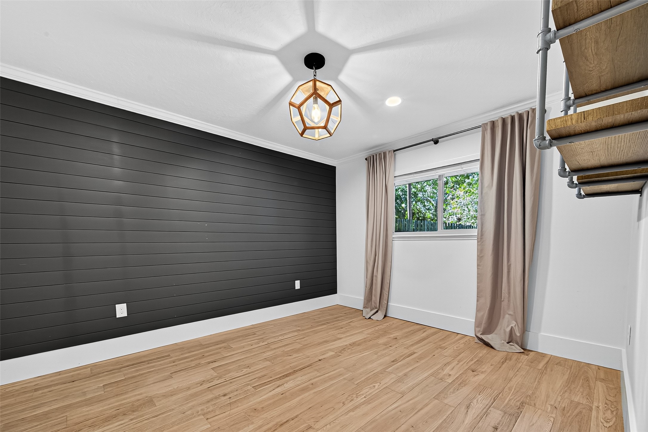 3115 Eula Morgan Road Katy, TX 77493 - Photo 27 of 36 a view of an empty room with wooden floor and a window