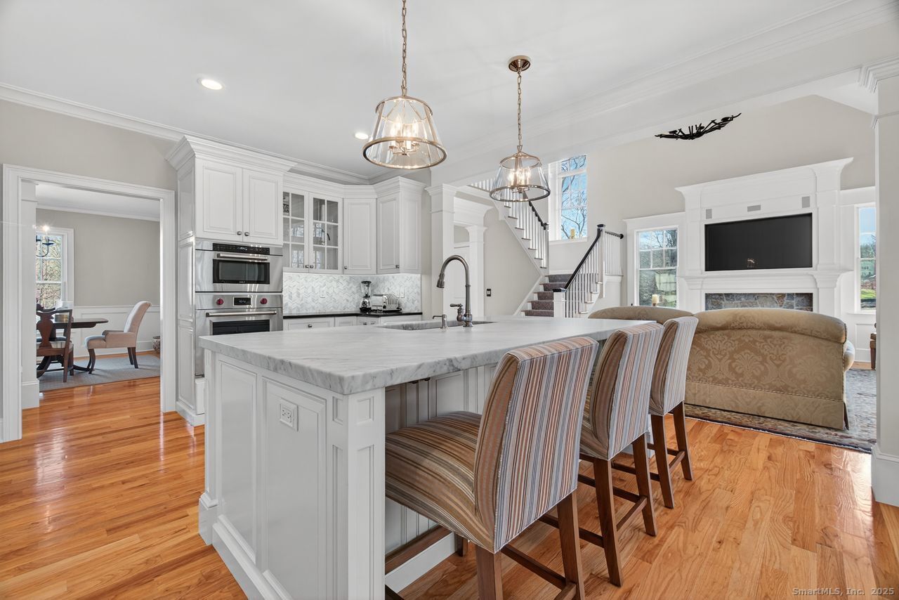 401 Fox Hopyard Road East Haddam, CT 06423 - Photo 14 of 38 a kitchen with stainless steel appliances granite countertop a stove and refrigerator