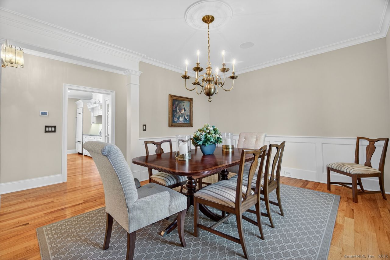 401 Fox Hopyard Road East Haddam, CT 06423 - Photo 16 of 38 a view of a dining room with furniture and wooden floor