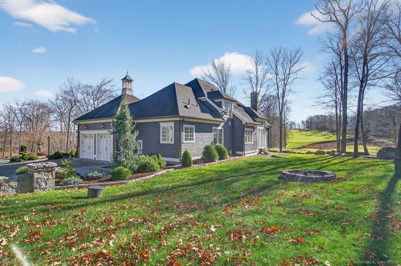 401 Fox Hopyard Road East Haddam, CT 06423 - Photo 2 of 38 a front view of house with yard and green space