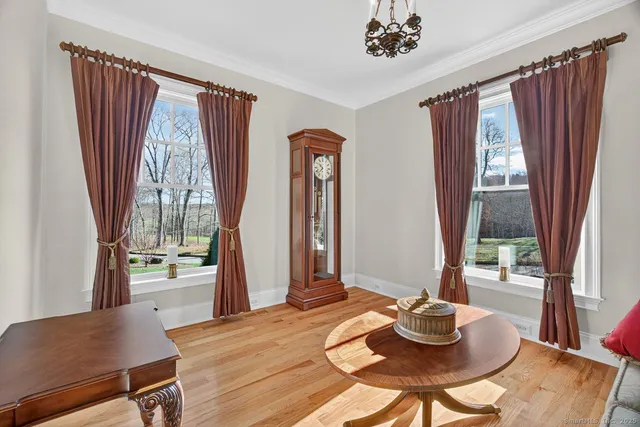 a workspace with furniture and window