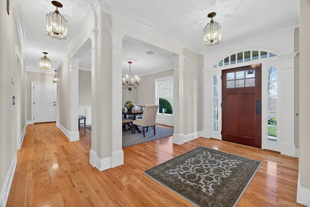 a view of livingroom with dining room and wooden floor