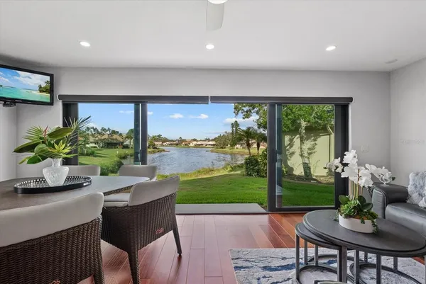 a dining room with furniture garden view and a potted plant