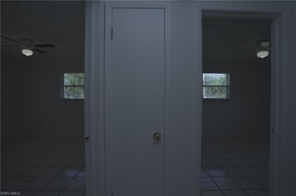 1195 South Alhambra Circle Naples, FL 34103 - Photo 13 of 34 a bathroom with a toilet